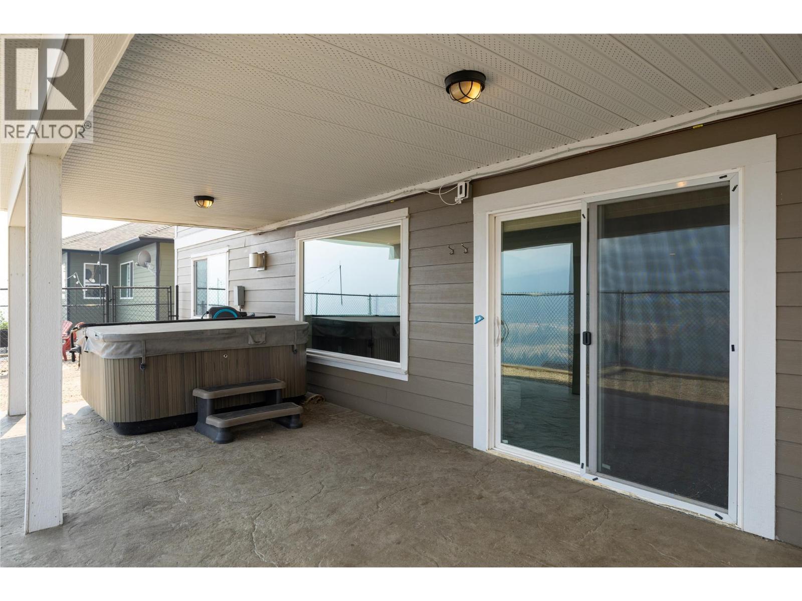 Hot Tub - 7261 Silver Ridge Drive, Vernon, BC - Outdoor With Deck Patio Veranda With Exterior