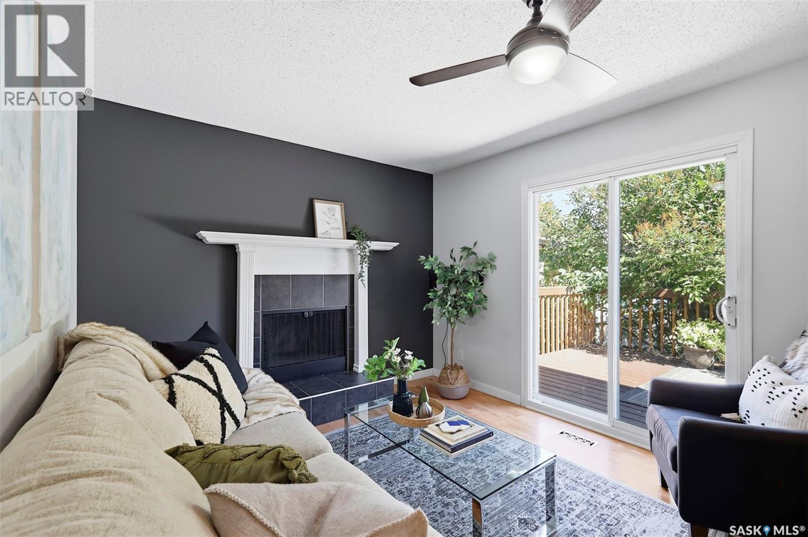 19 Nash Place, Saskatoon, SK - Indoor Photo Showing Living Room With Fireplace