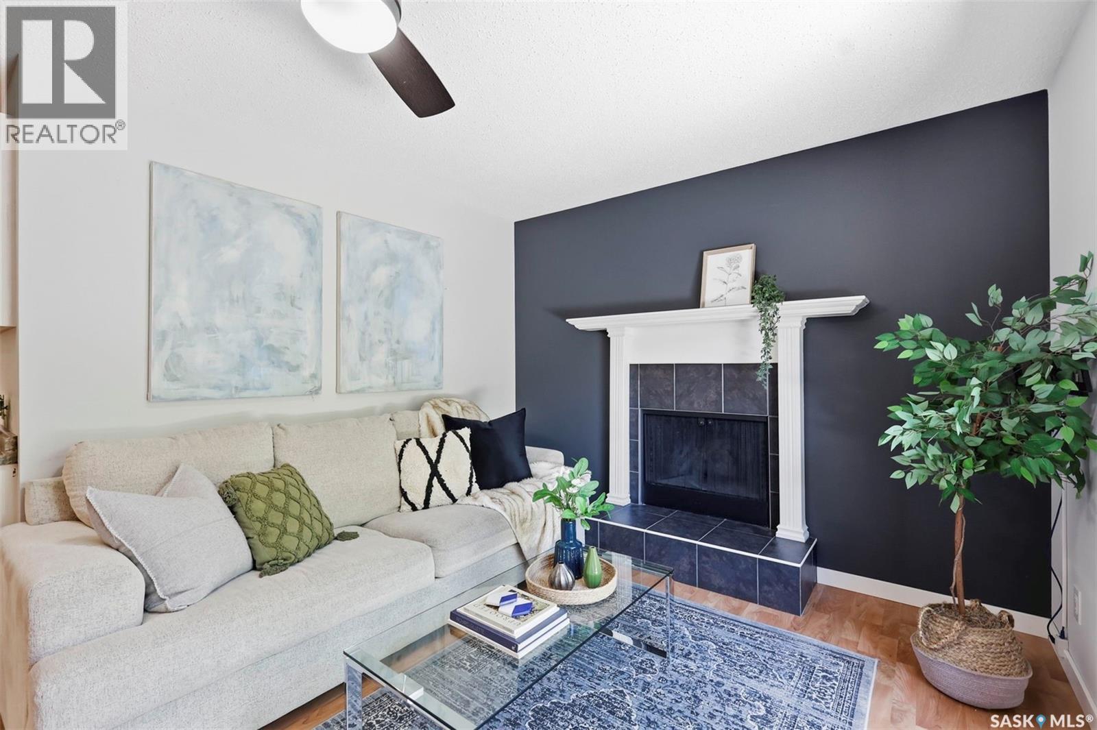 19 Nash Place, Saskatoon, SK - Indoor Photo Showing Living Room With Fireplace