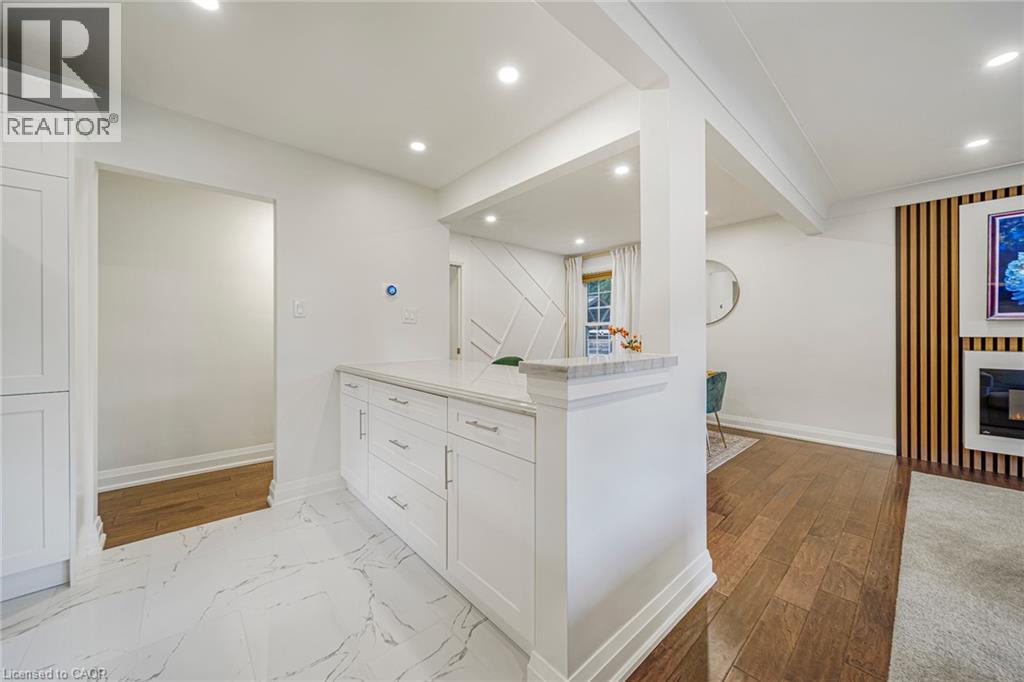 24 Garvey Crescent, Hamilton, ON - Indoor Photo Showing Other Room With Fireplace