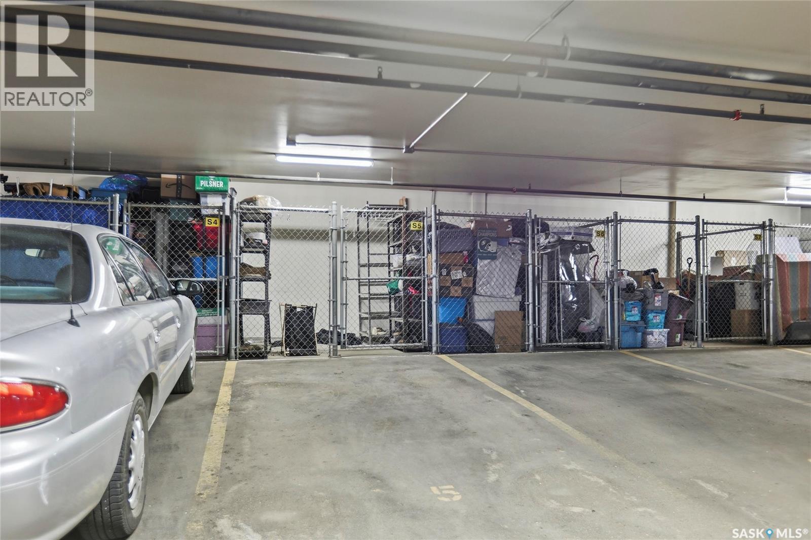 106 6345 Rochdale Boulevard, Regina, SK - Indoor Photo Showing Garage