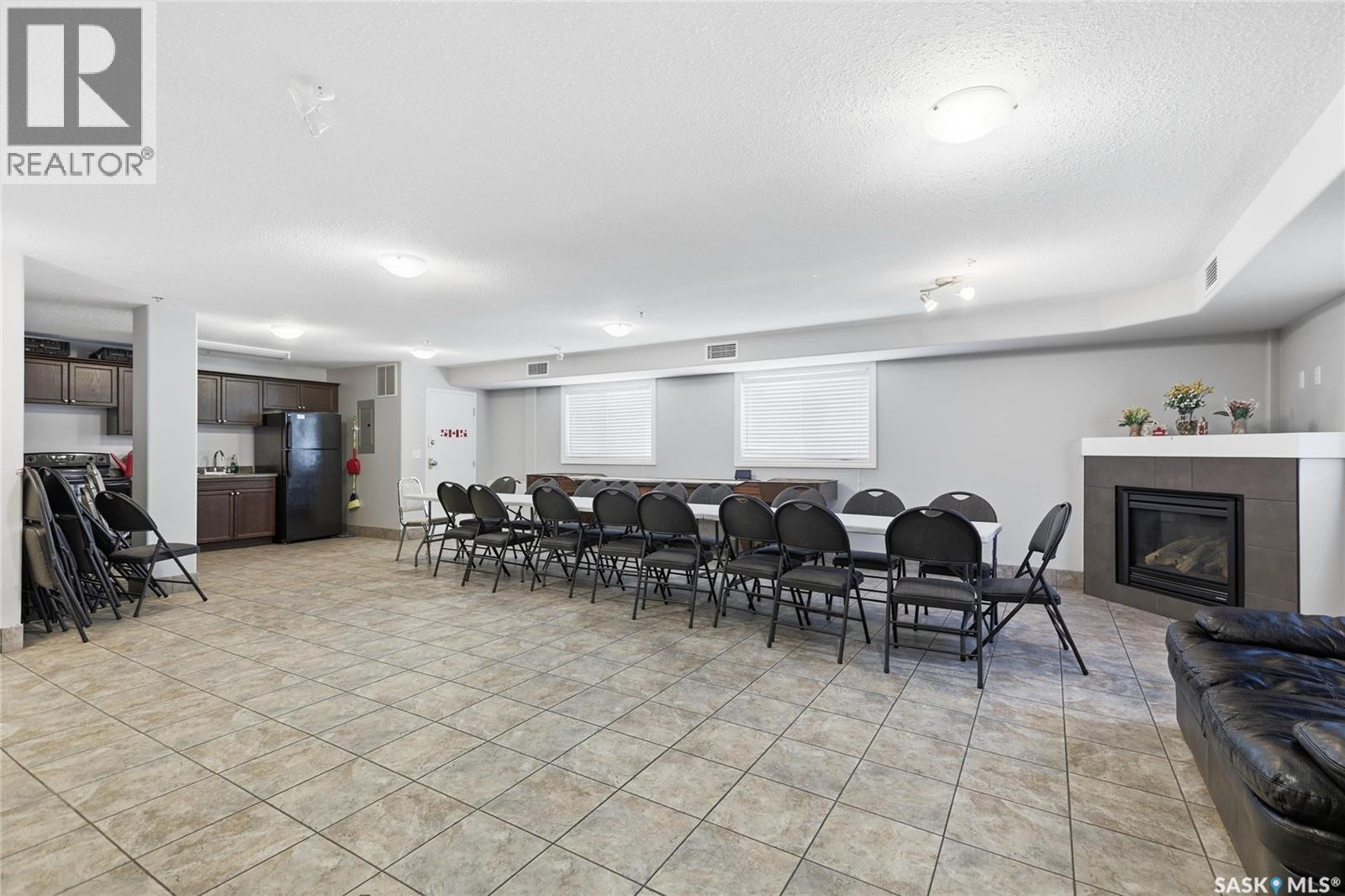 106 6345 Rochdale Boulevard, Regina, SK - Indoor With Fireplace