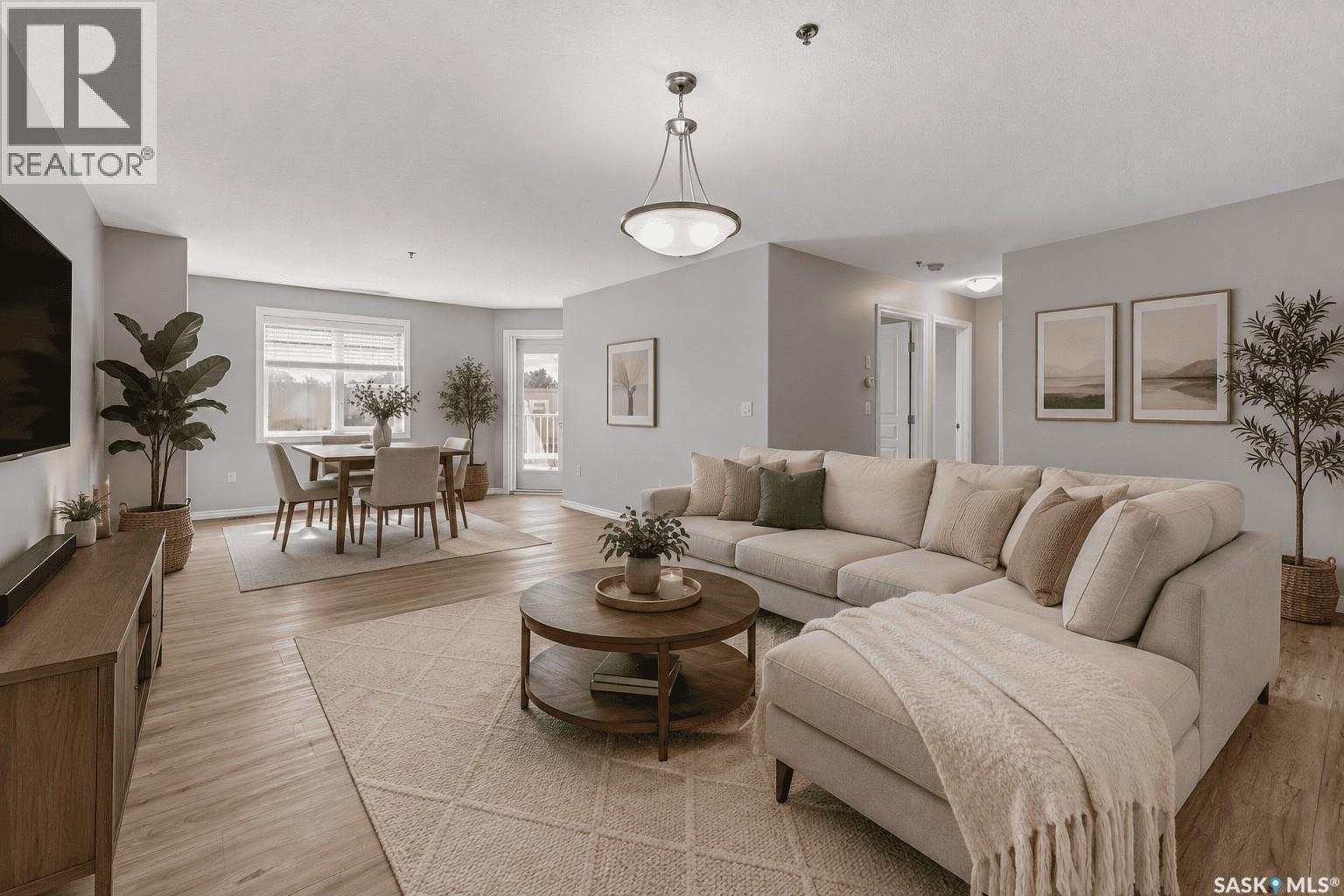 106 6345 Rochdale Boulevard, Regina, SK - Indoor Photo Showing Living Room