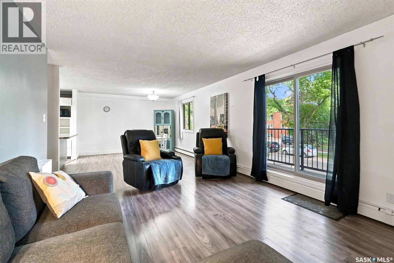 102 1008 Temperance Street, Saskatoon, SK - Indoor Photo Showing Living Room