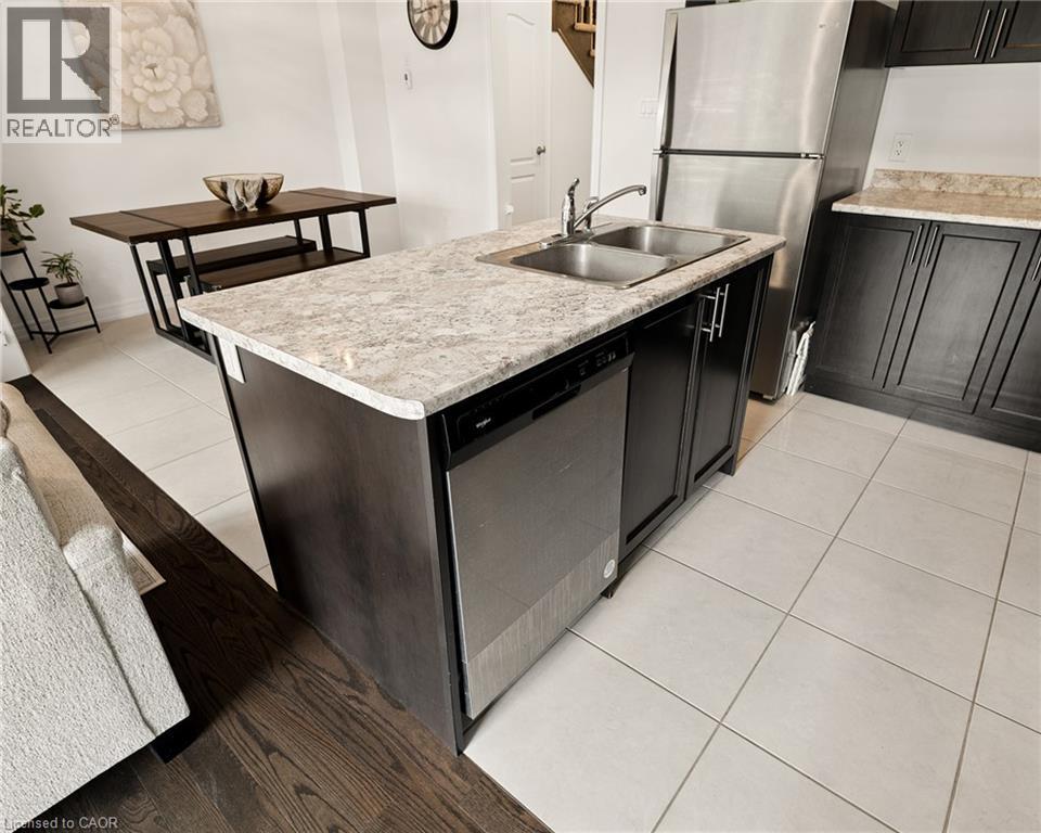 166 Deerpath Drive Unit# 49, Guelph, ON - Indoor Photo Showing Kitchen With Double Sink