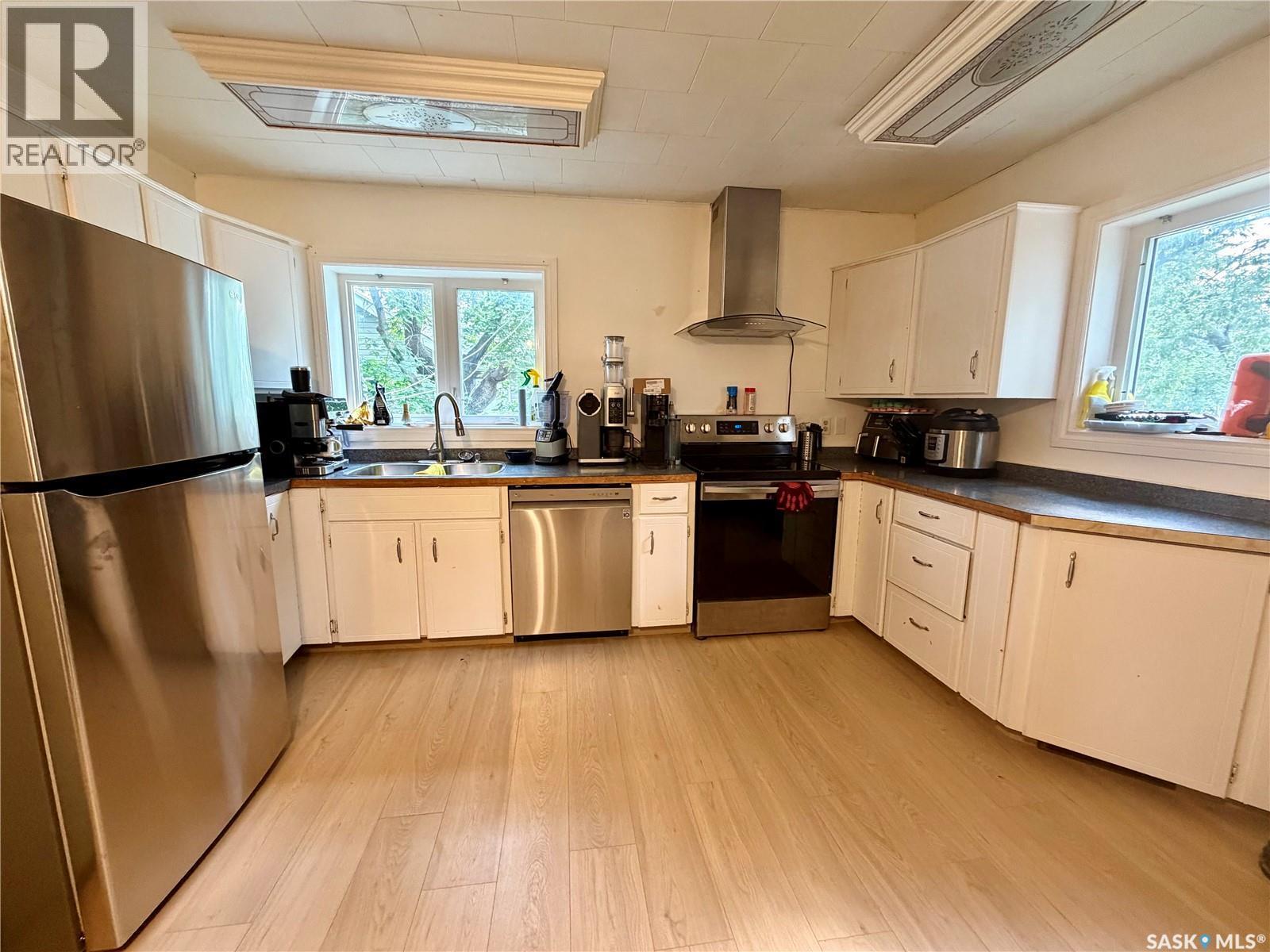 111 1St Street W, Carrot River, SK - Indoor Photo Showing Kitchen With Double Sink
