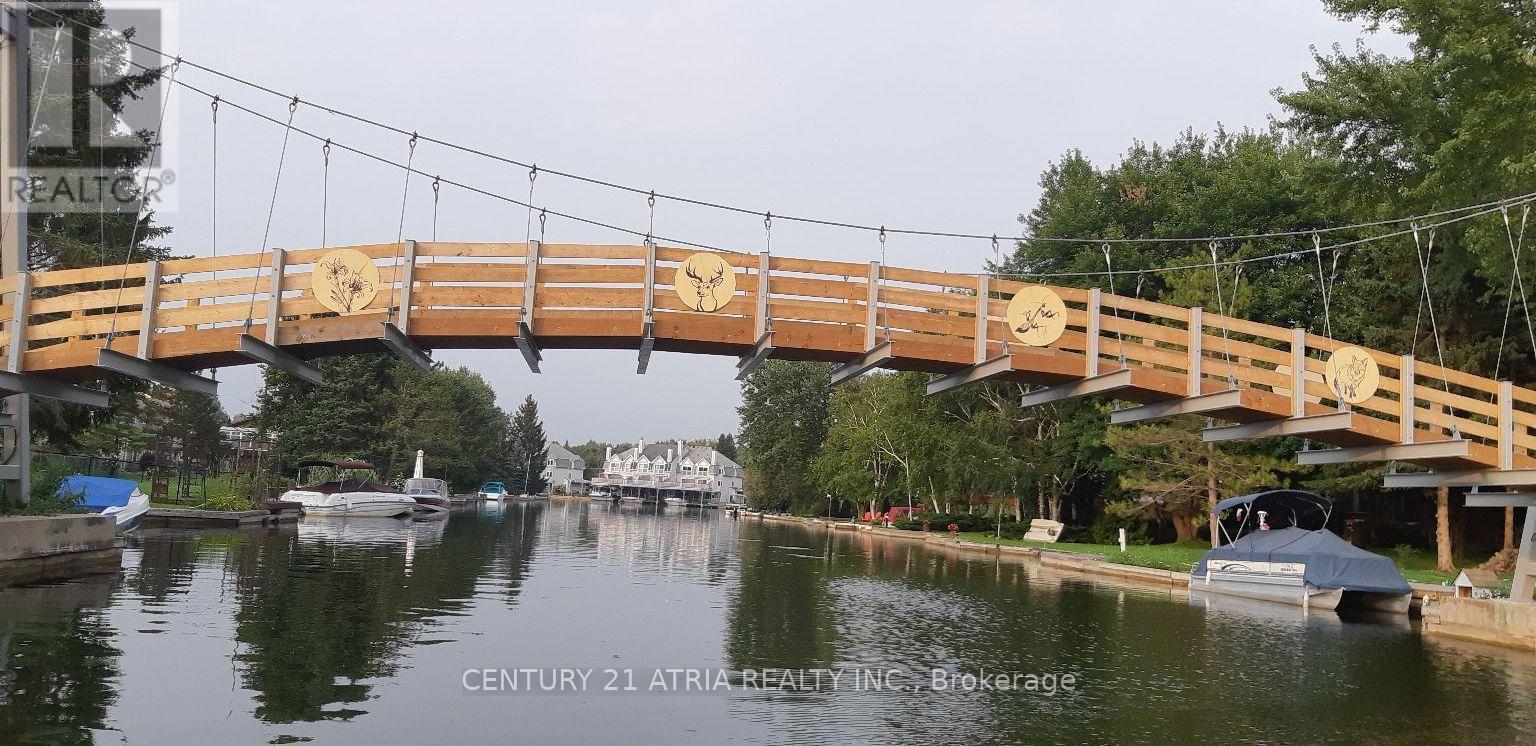 24 - 4 Paradise Boulevard, Ramara, ON - Outdoor With Body Of Water