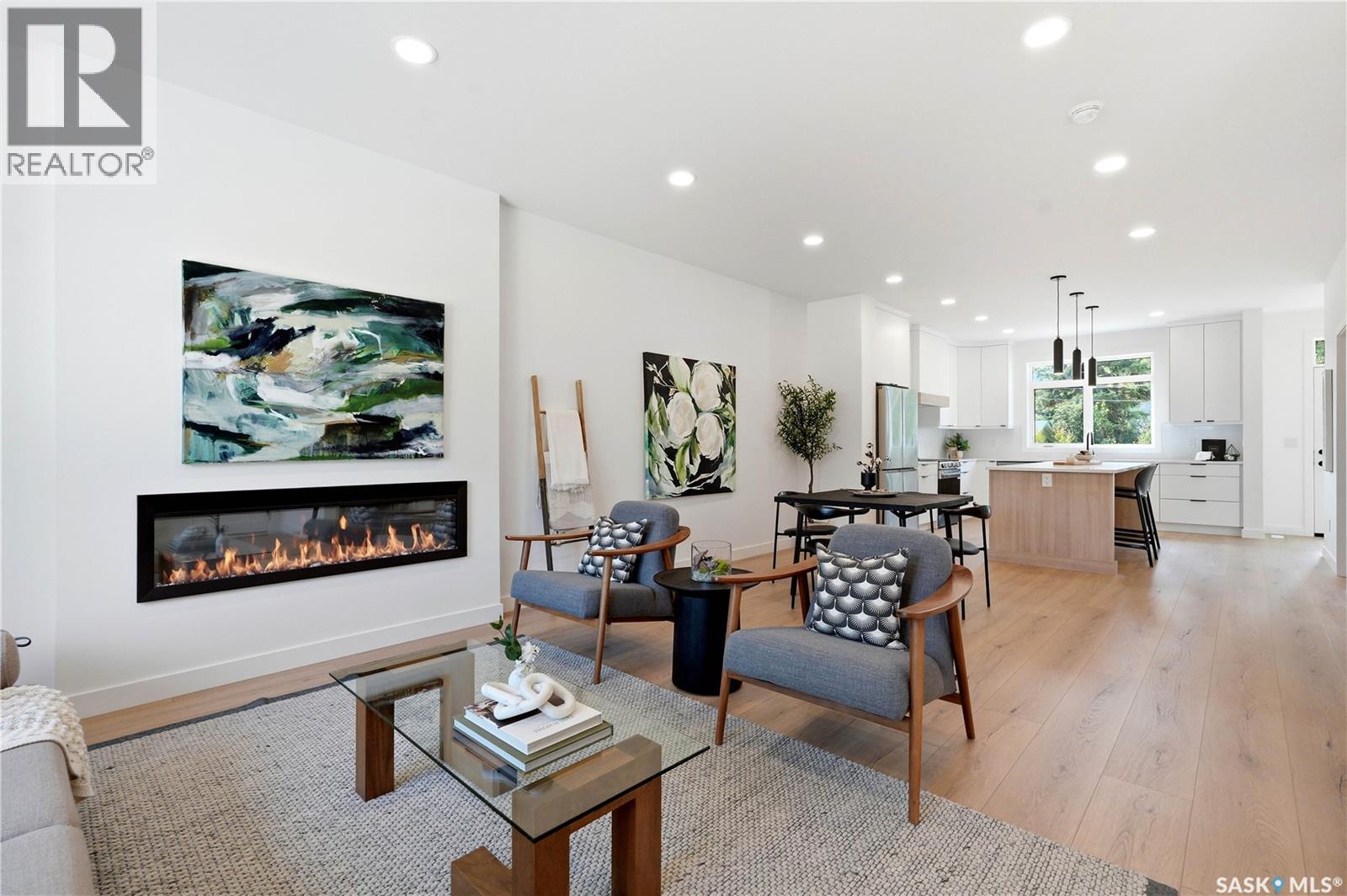 1514 Ewart Avenue, Saskatoon, SK - Indoor Photo Showing Living Room With Fireplace