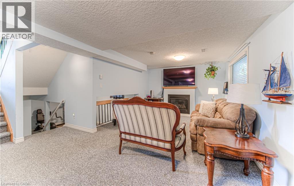 82 Roseneath Crescent, Kitchener, ON - Indoor With Fireplace