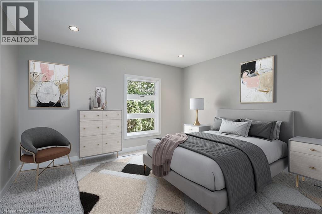 Recessed ceiling lighting, light-toned wall color, window with exterior landscaping, and textile flooring - 4189 Inglewood Drive, Burlington, ON - Indoor Photo Showing Bedroom