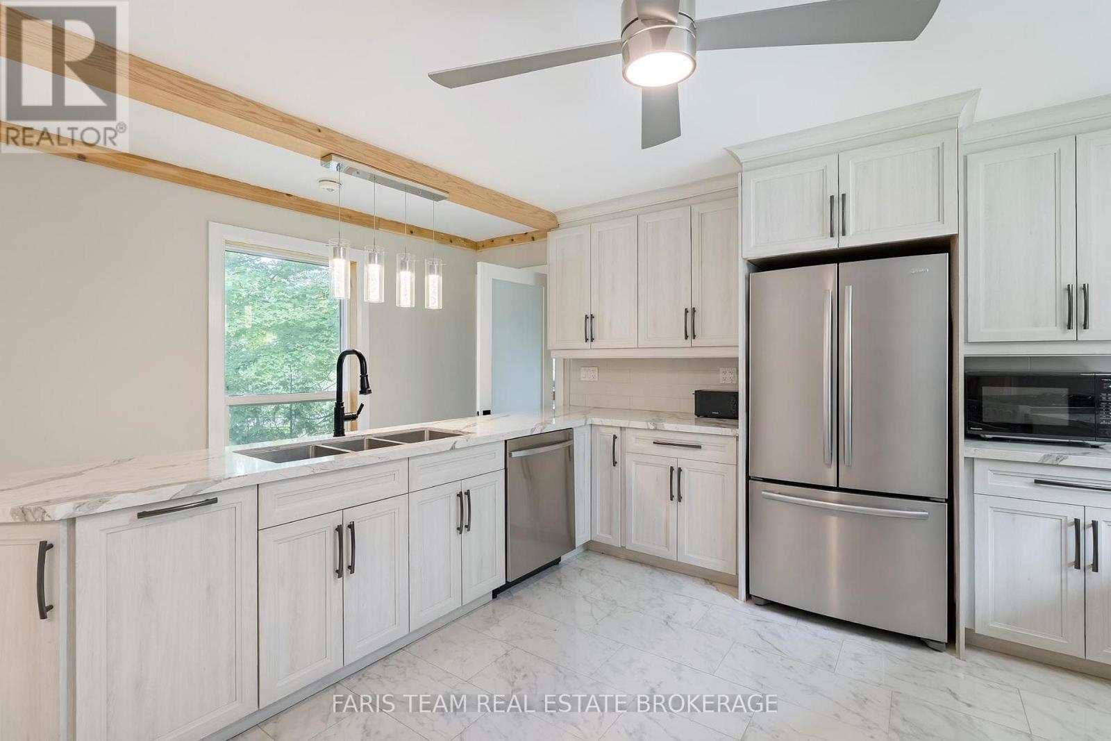 Virtually Staged - 8 Joliet Crescent, Tiny, ON - Indoor Photo Showing Kitchen With Double Sink