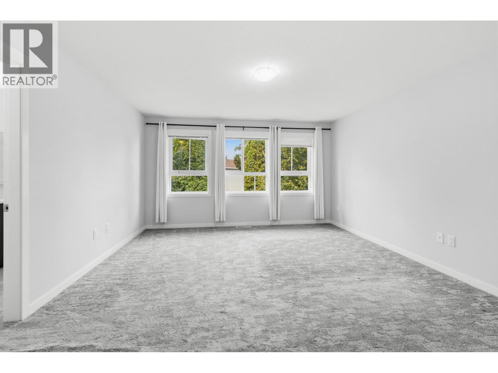 Primary bedroom- second floor - 680 Old Meadows Road Unit# 74, Kelowna, BC - Indoor Photo Showing Other Room