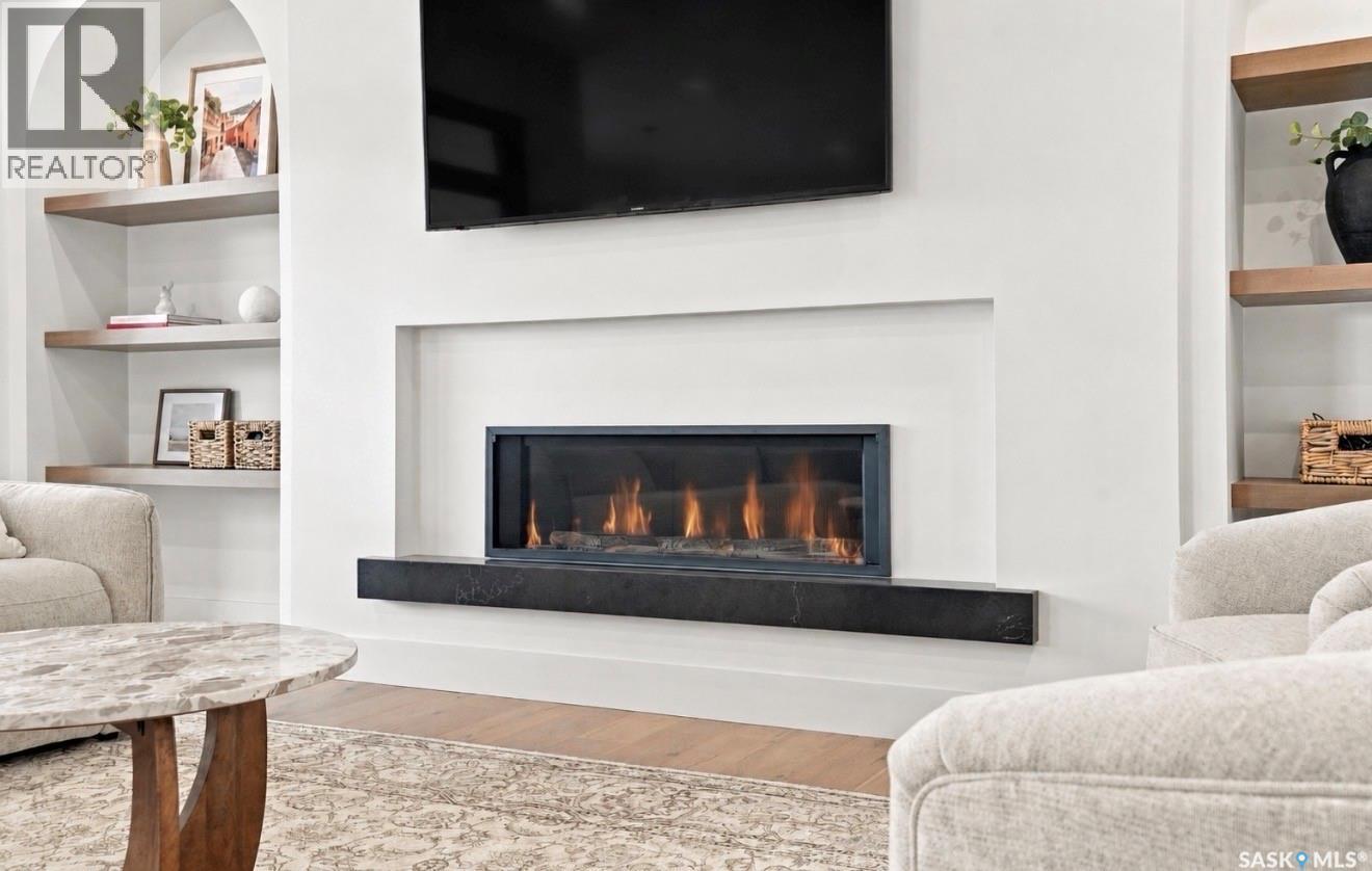 652 Pepper Bend, Saskatoon, SK - Indoor Photo Showing Living Room With Fireplace