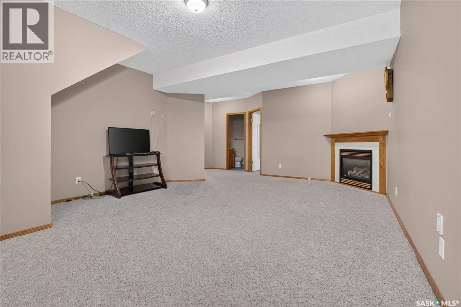 3547 Hazel Grove, Regina, SK - Indoor With Fireplace