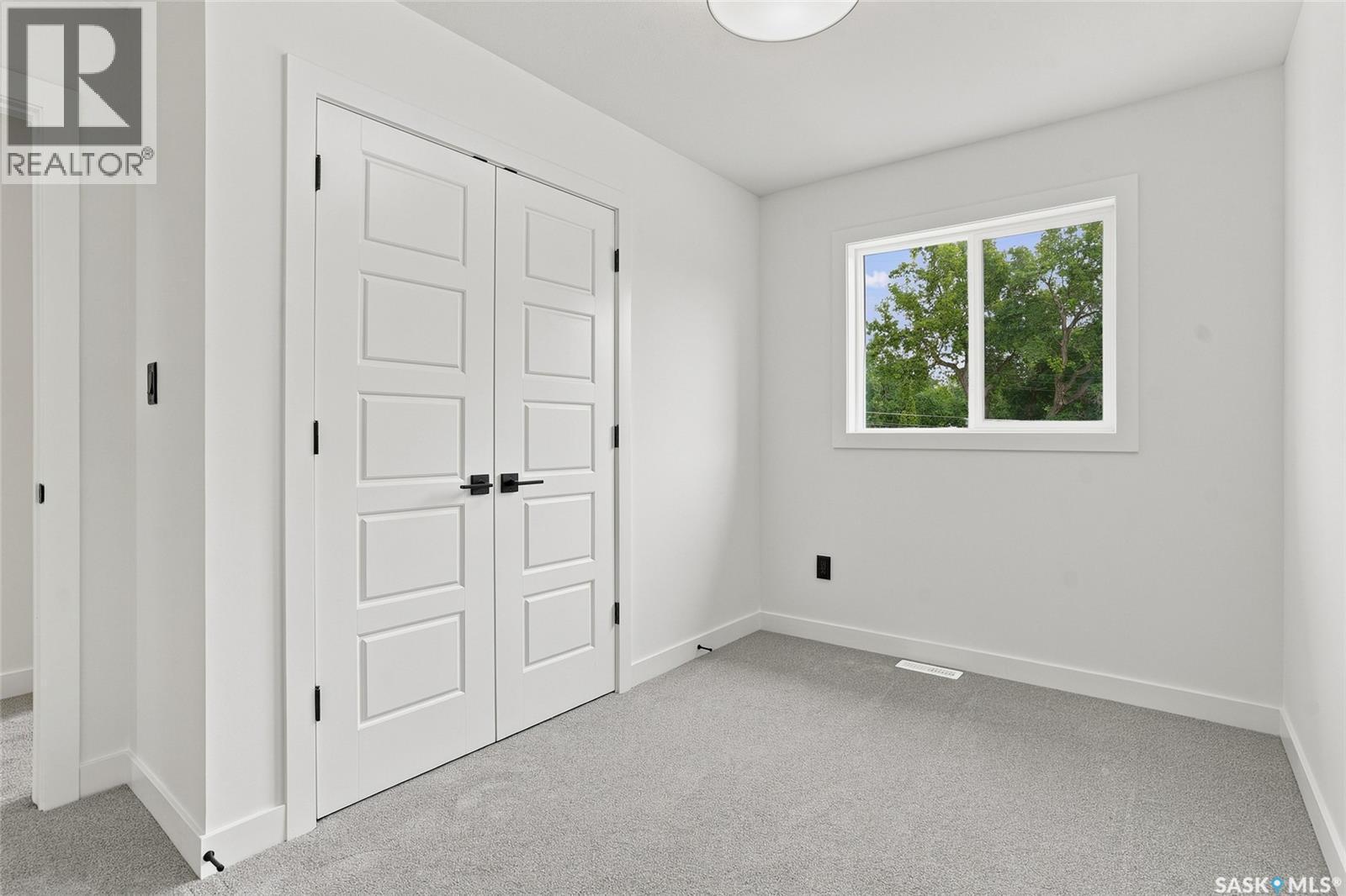 1220 H Avenue N, Saskatoon, SK - Indoor Photo Showing Other Room