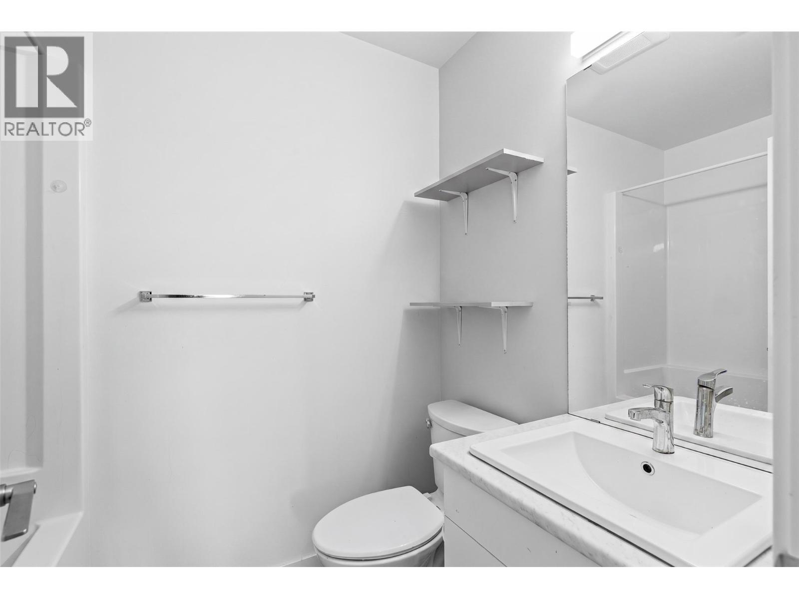 Virtually staged to showcase potential use of space - 2345 Butt Road Unit# 415, West Kelowna, BC - Indoor Photo Showing Bathroom