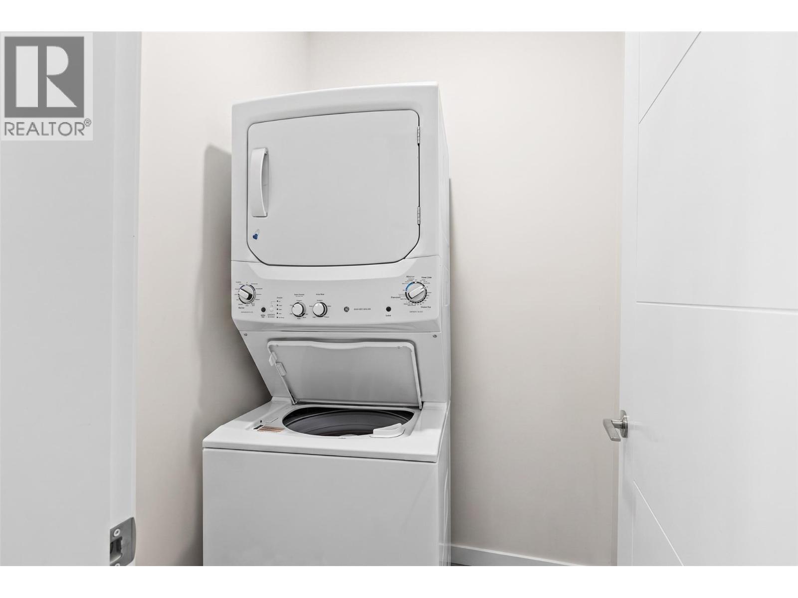 Virtually staged to showcase potential use of space - 2345 Butt Road Unit# 415, West Kelowna, BC - Indoor Photo Showing Laundry Room