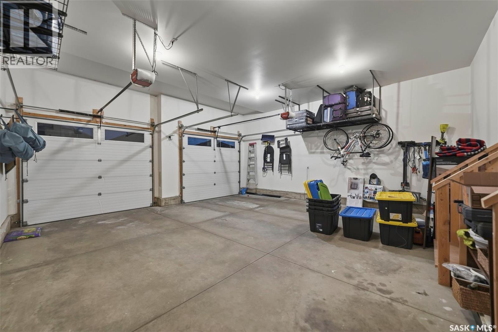 107 Schumacher Bay, Saskatoon, SK - Indoor Photo Showing Garage