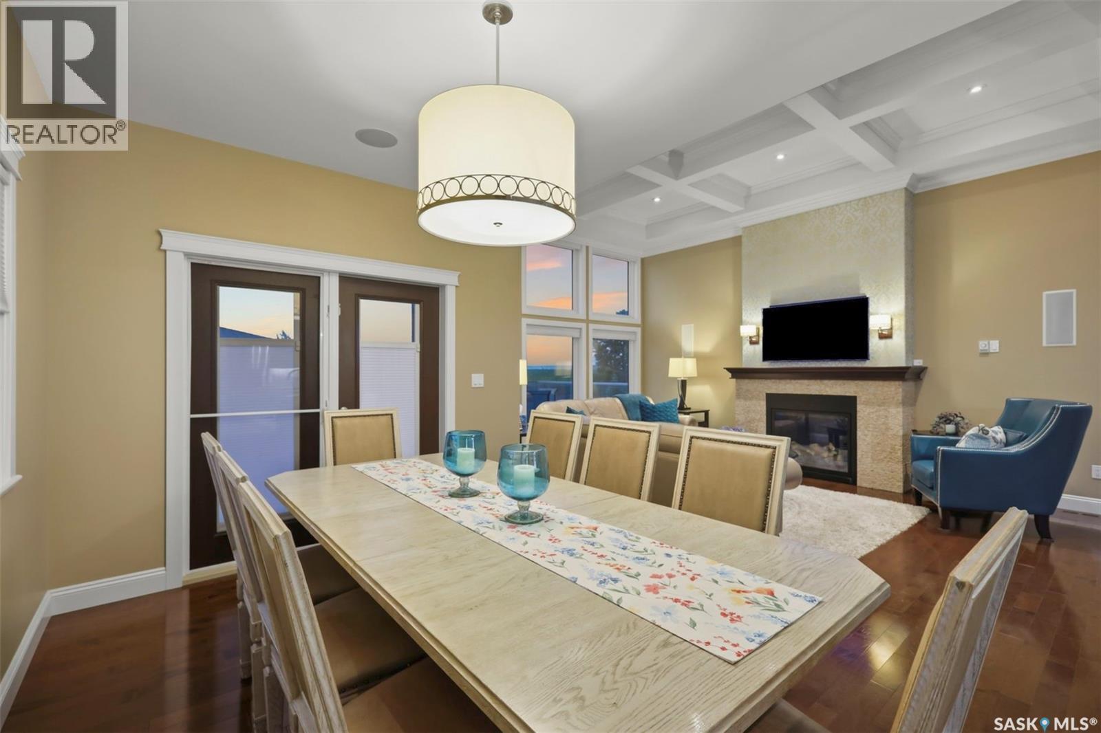 431 Paton Place, Saskatoon, SK - Indoor Photo Showing Dining Room With Fireplace