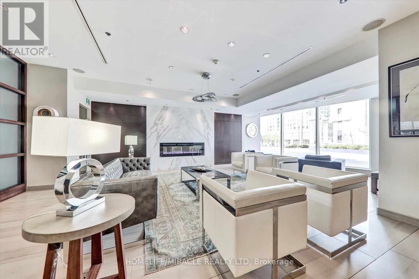 712 - 38 Lee Centre Drive, Toronto, ON - Indoor With Fireplace