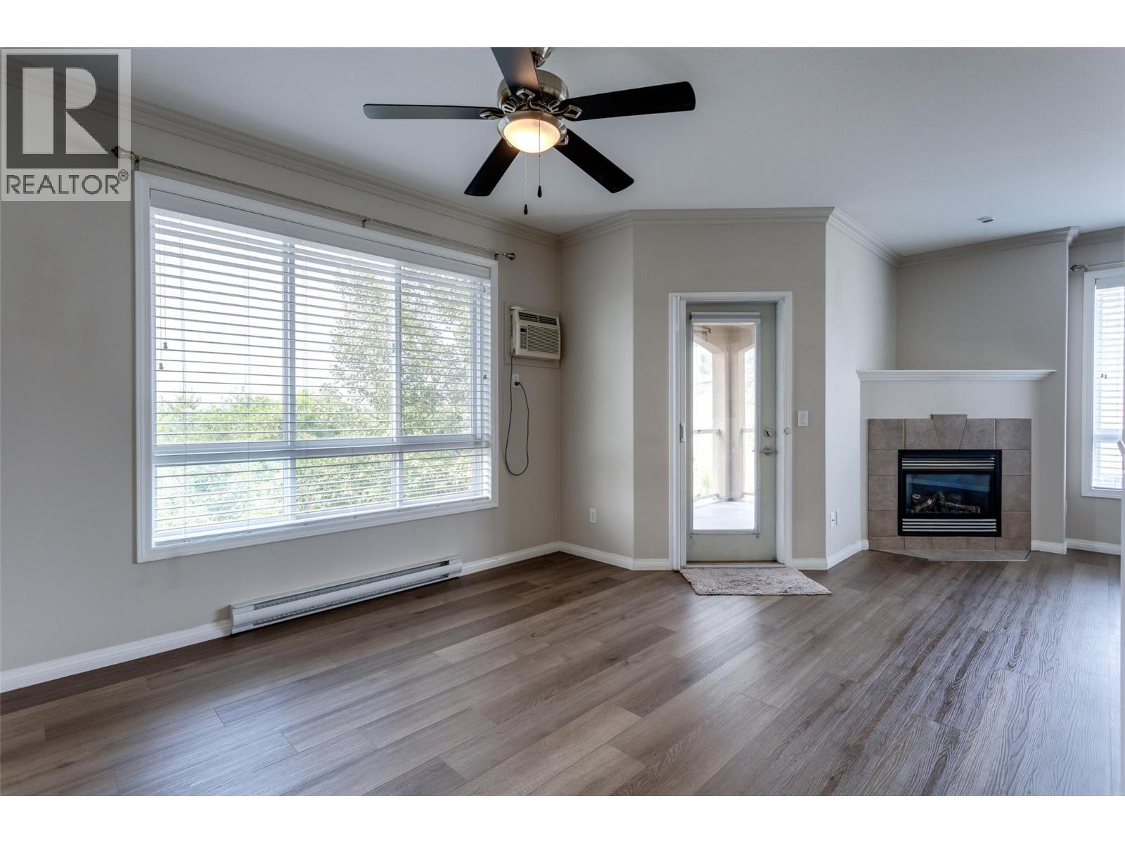 1962 Enterprise Way Unit# 401, Kelowna, BC - Indoor With Fireplace