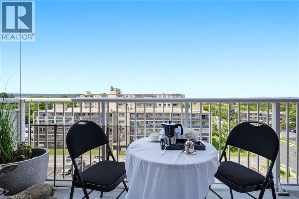 Balcony with metal railings and concrete flooring - 8 Woodman Drive S Unit# 708, Hamilton, ON - Outdoor With Balcony