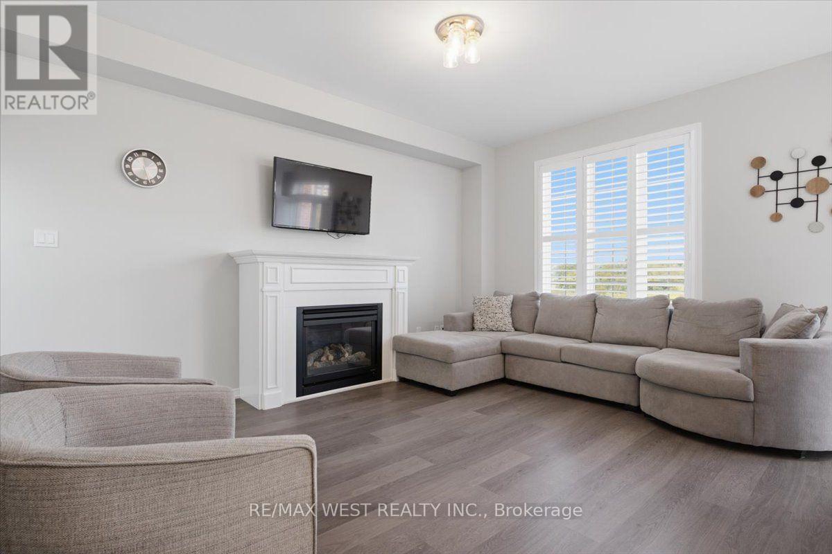 29 Stockell Crescent, Ajax, ON - Indoor Photo Showing Living Room With Fireplace