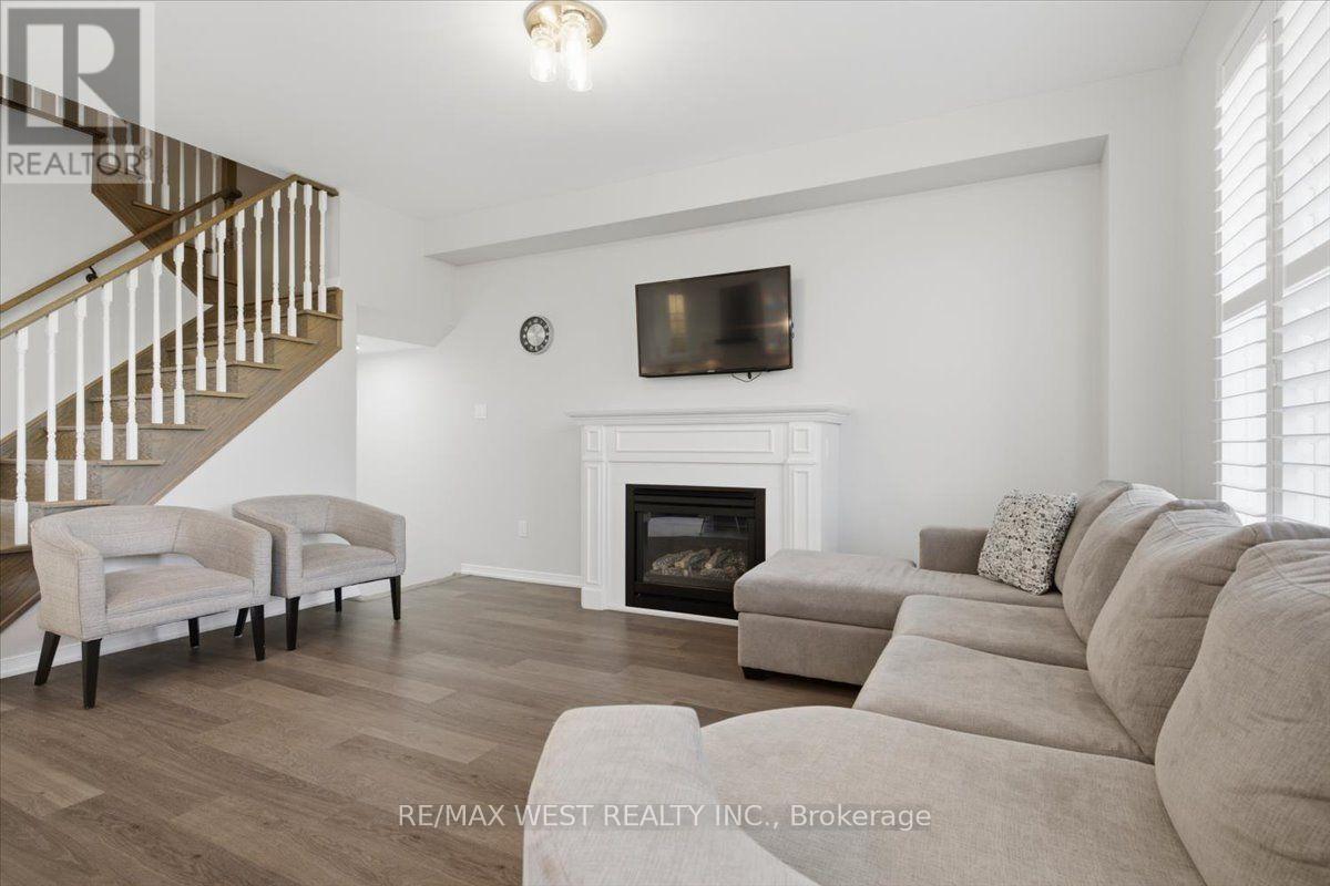 29 Stockell Crescent, Ajax, ON - Indoor Photo Showing Living Room With Fireplace
