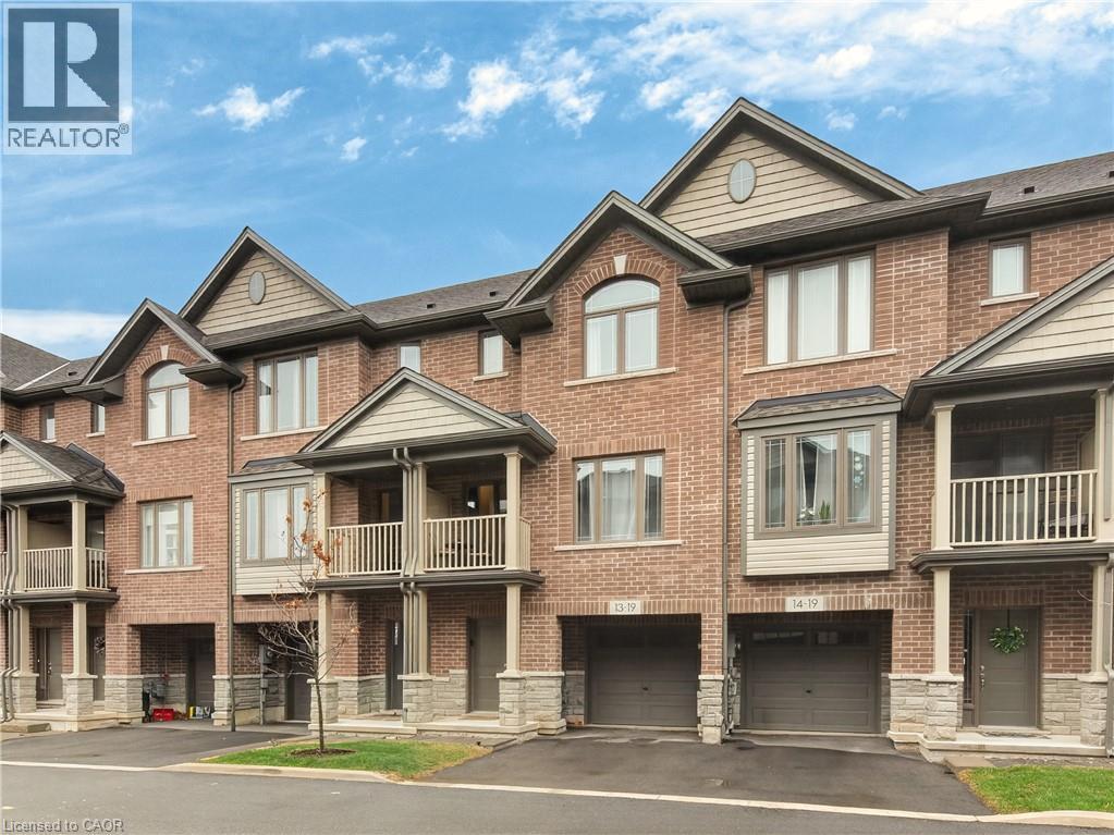 Brick exterior with stone accents and multiple balconies - 19 Picardy Drive Unit# 13, Hamilton, ON - Outdoor With Facade
