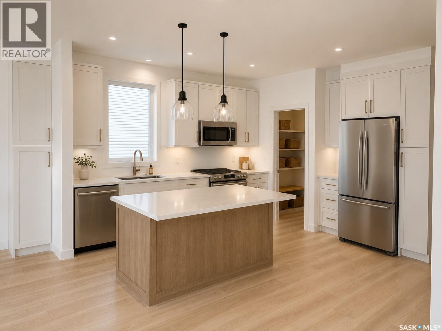 310 Nazarali Avenue, Saskatoon, SK - Indoor Photo Showing Kitchen With Upgraded Kitchen