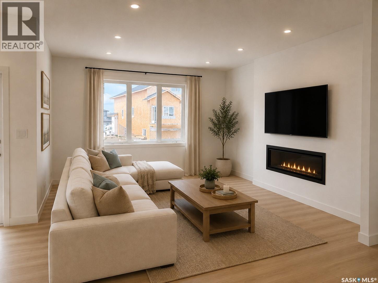 310 Nazarali Avenue, Saskatoon, SK - Indoor Photo Showing Living Room With Fireplace