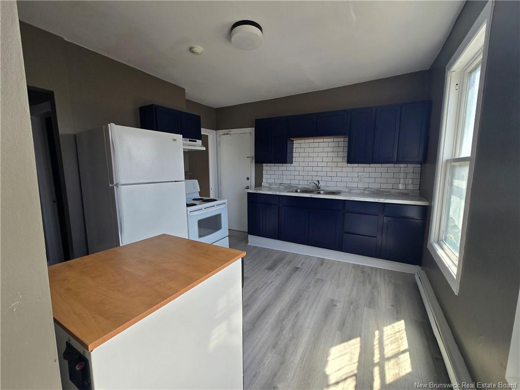 130-132 Broad St, Saint John, NB - Indoor Photo Showing Kitchen With Double Sink