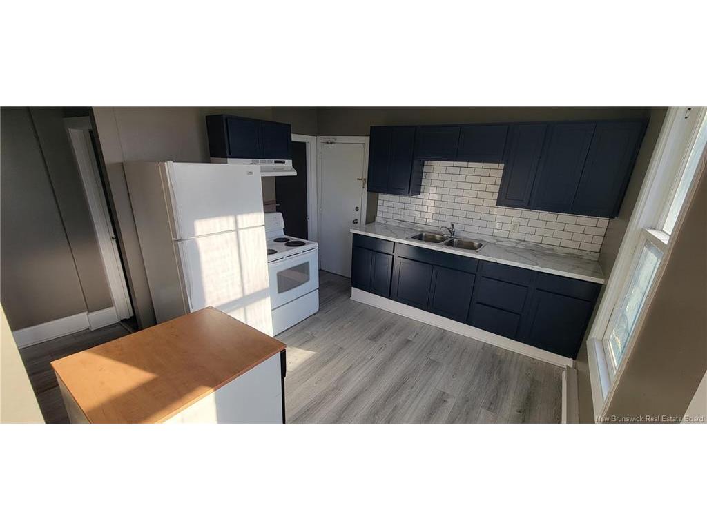 130-132 Broad St, Saint John, NB - Indoor Photo Showing Kitchen With Double Sink