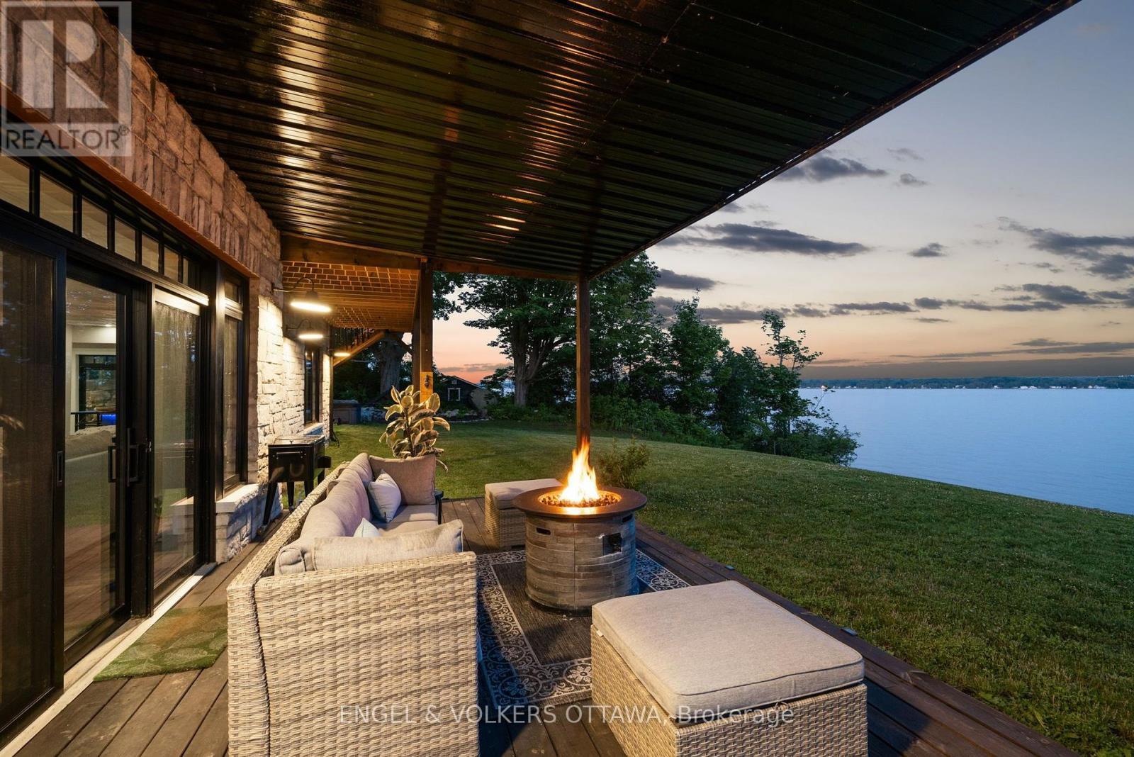 Walkout Covered Patio - 5 Shoreside Way, Augusta, ON - Outdoor With Body Of Water With Deck Patio Veranda