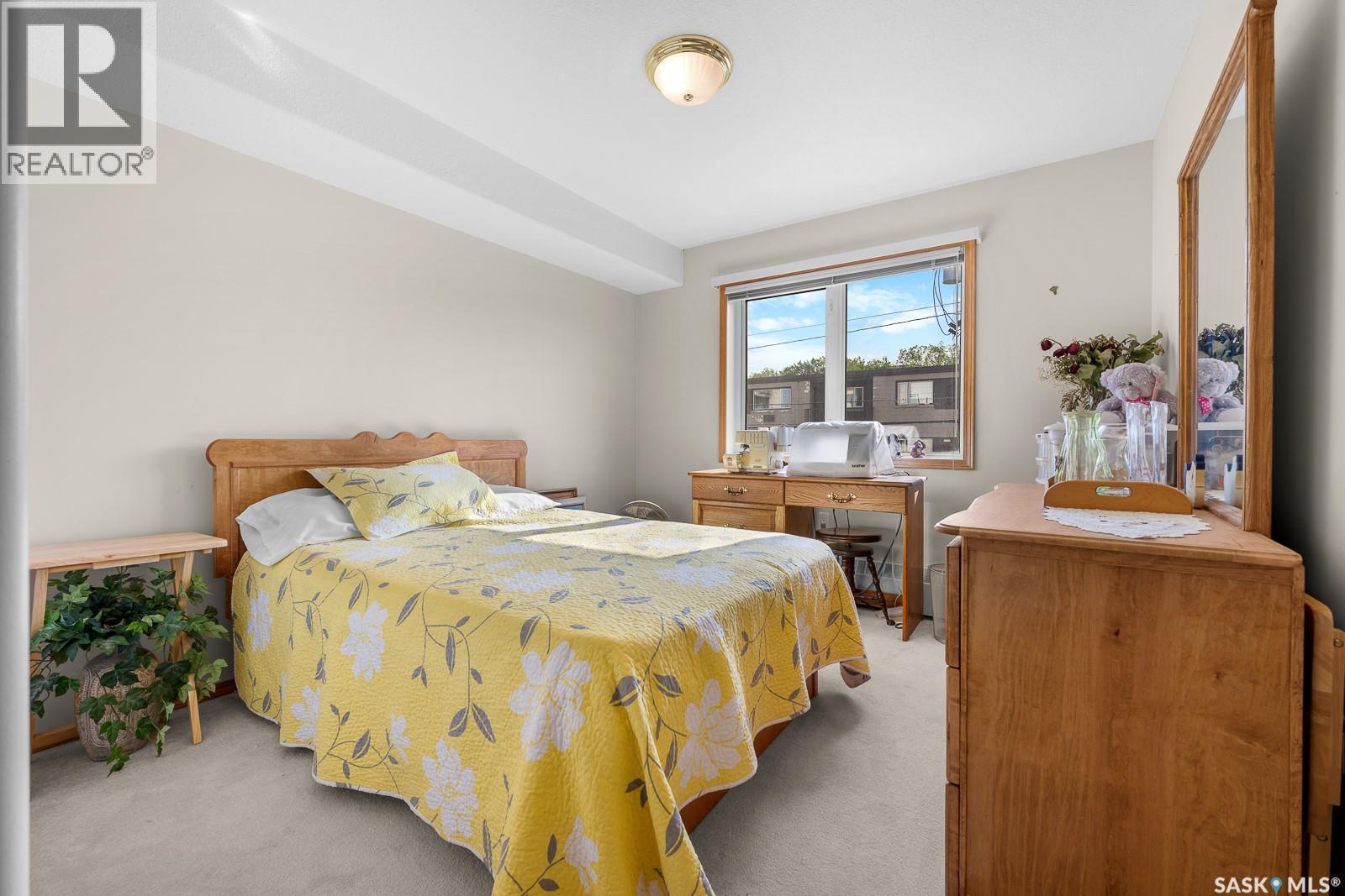 207 205 Mcintyre Street, Regina, SK - Indoor Photo Showing Bedroom