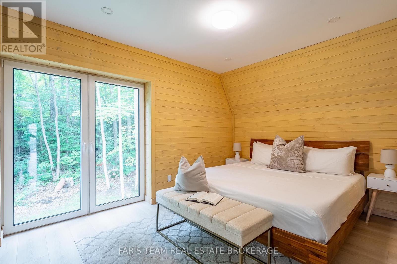 1490 Champlain Road, Tiny, ON - Indoor Photo Showing Bedroom