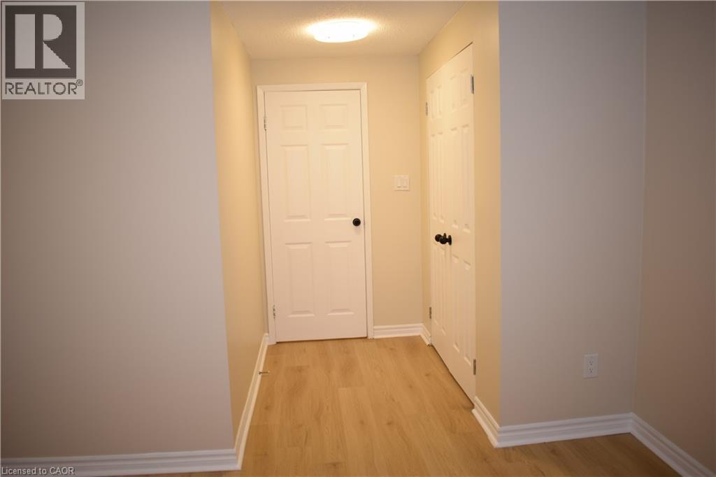 Wood-finish flooring - 655 Albert Street Unit# A, Waterloo, ON - Indoor Photo Showing Other Room