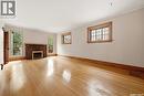 21 Angus Crescent, Regina, SK  - Indoor Photo Showing Other Room With Fireplace 
