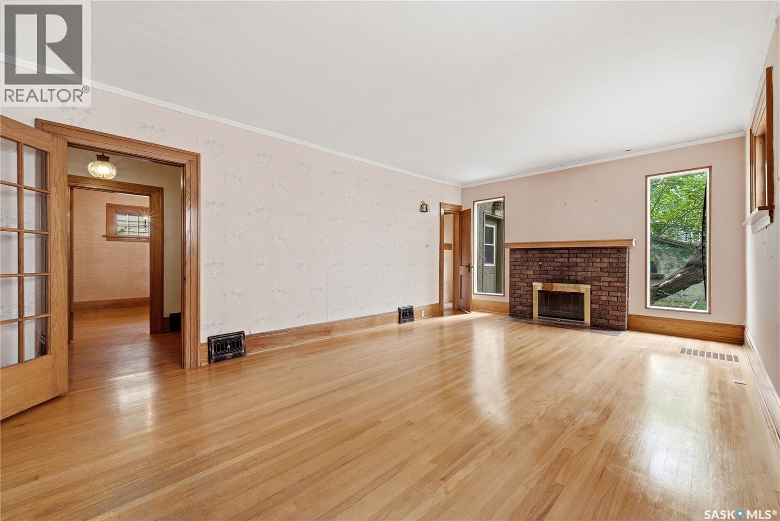 21 Angus Crescent, Regina, SK - Indoor With Fireplace