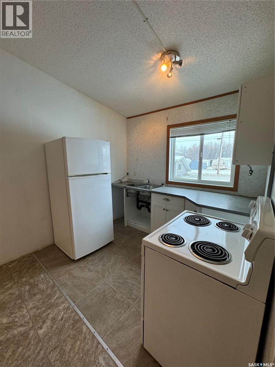 701 2Nd Avenue E, Shellbrook, SK - Indoor Photo Showing Kitchen With Double Sink