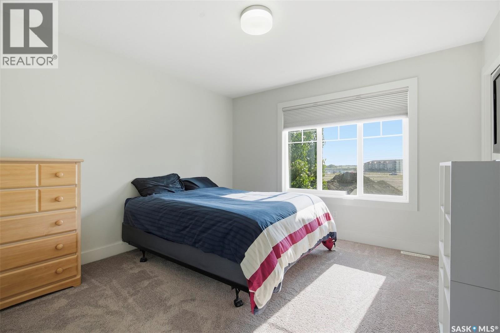 618 701 Meadows Boulevard, Saskatoon, SK - Indoor Photo Showing Bedroom