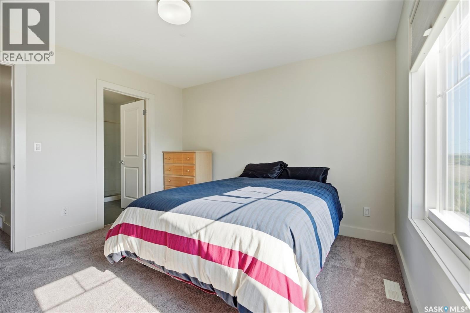 618 701 Meadows Boulevard, Saskatoon, SK - Indoor Photo Showing Bedroom