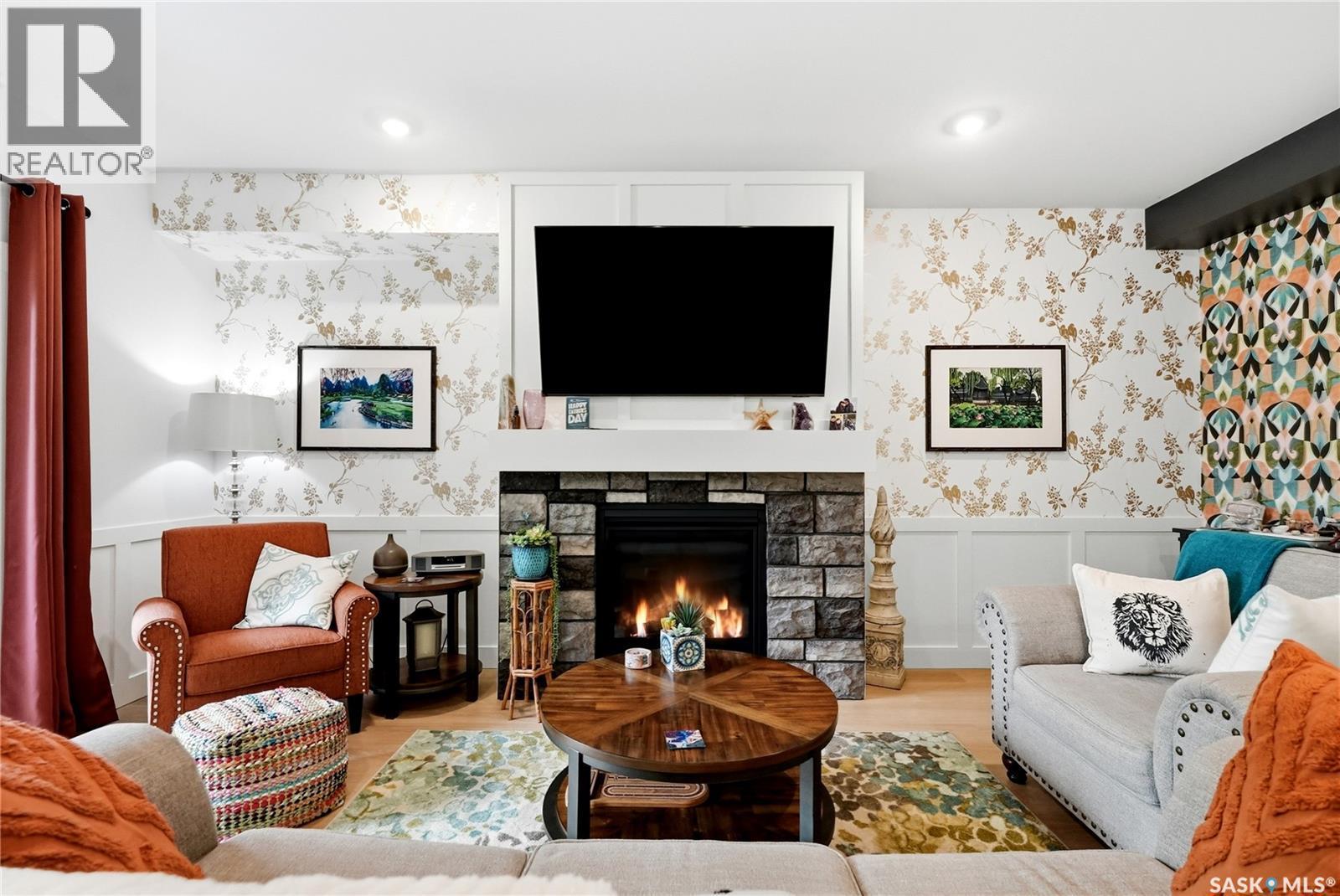 147 3220 11Th Street, Saskatoon, SK - Indoor Photo Showing Living Room With Fireplace