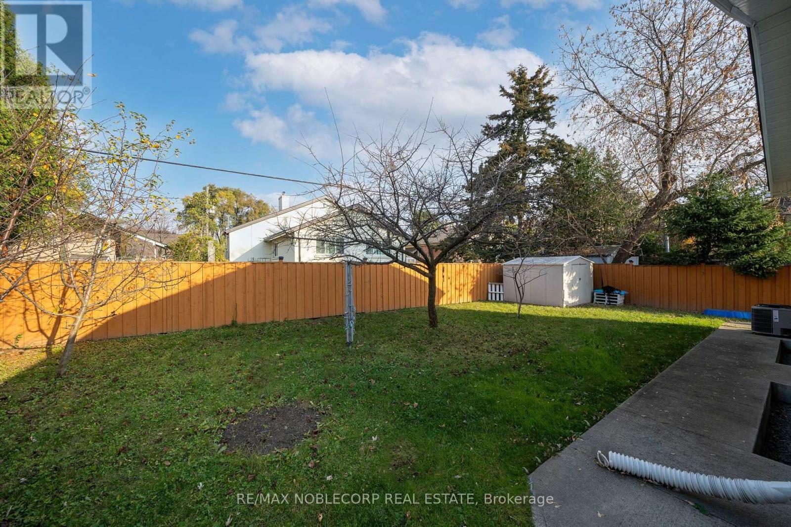 4230 Bloor Street W, Toronto, ON - Outdoor With Backyard