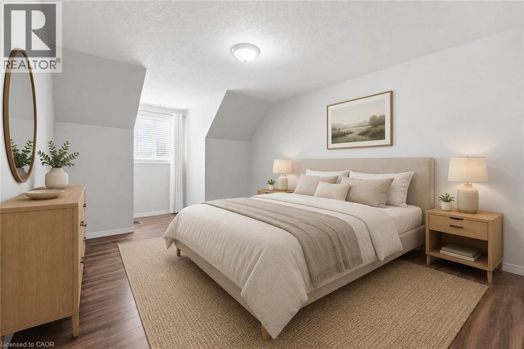 Virtually Staged primary bedroom - 449 Exmoor Street, Waterloo, ON - Indoor Photo Showing Bedroom