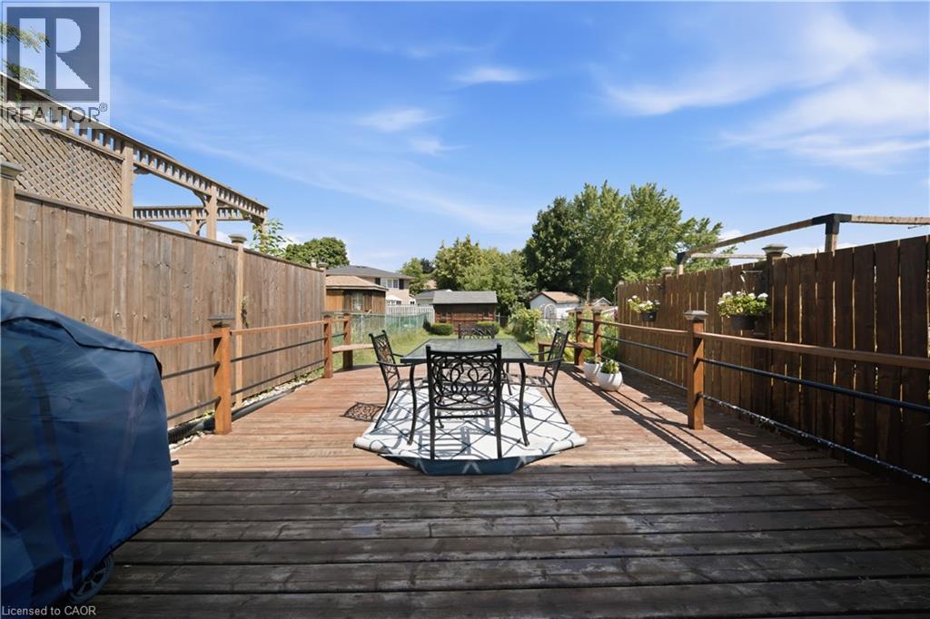 Expansive wood deck with a perimeter railing and privacy fencing - 230 Sunset Boulevard, Cambridge, ON - Outdoor With Deck Patio Veranda With Exterior