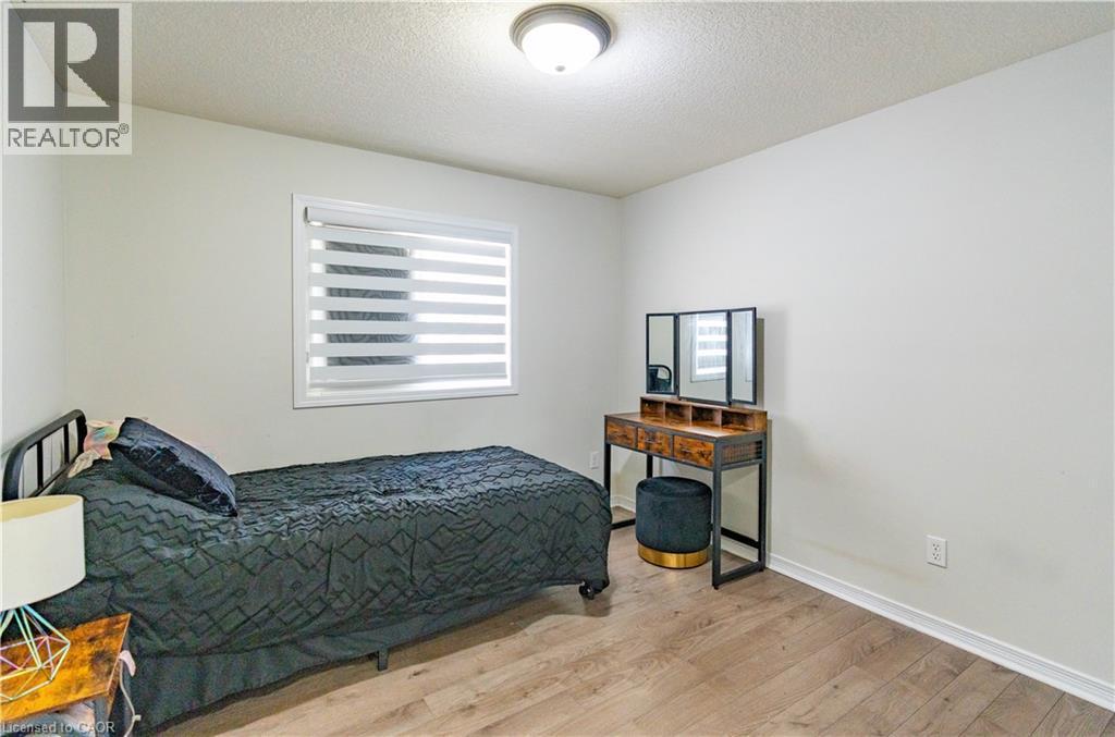 Recessed window with layered blinds - 122 Iron Gate Street, Kitchener, ON - Indoor Photo Showing Bedroom