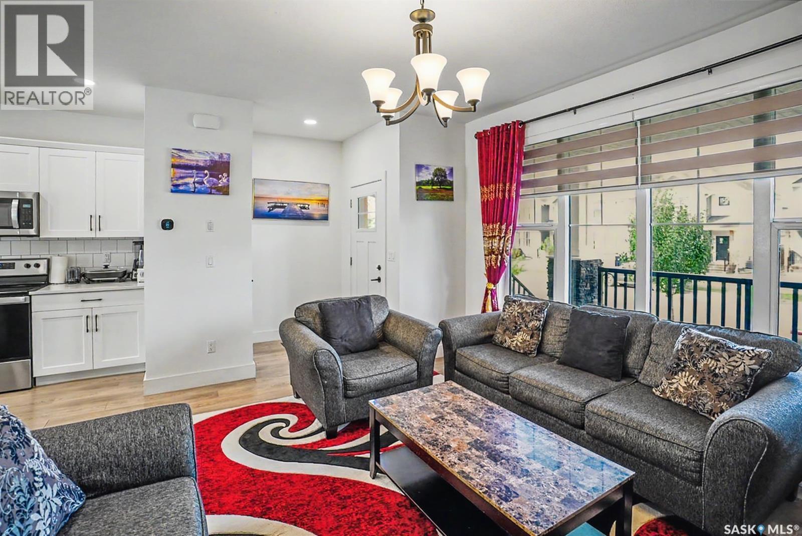 138 Rosewood Boulevard E, Saskatoon, SK - Indoor Photo Showing Living Room