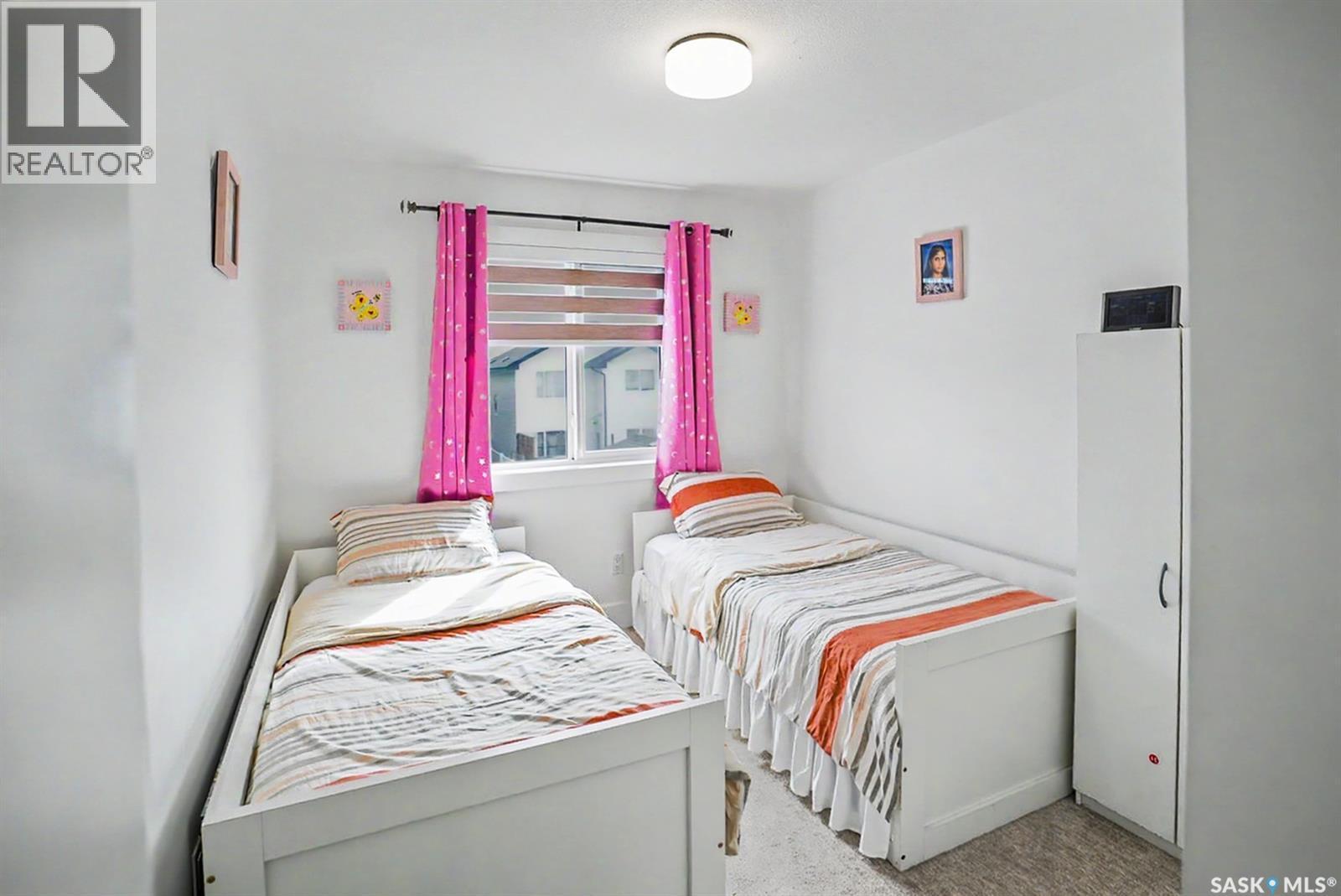 138 Rosewood Boulevard E, Saskatoon, SK - Indoor Photo Showing Bedroom