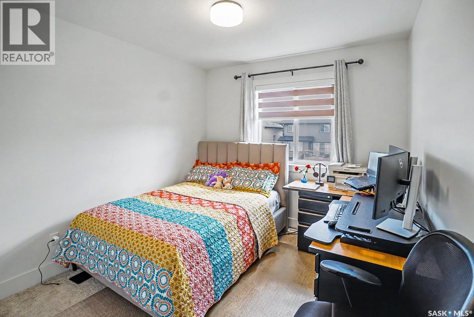 138 Rosewood Boulevard E, Saskatoon, SK - Indoor Photo Showing Bedroom